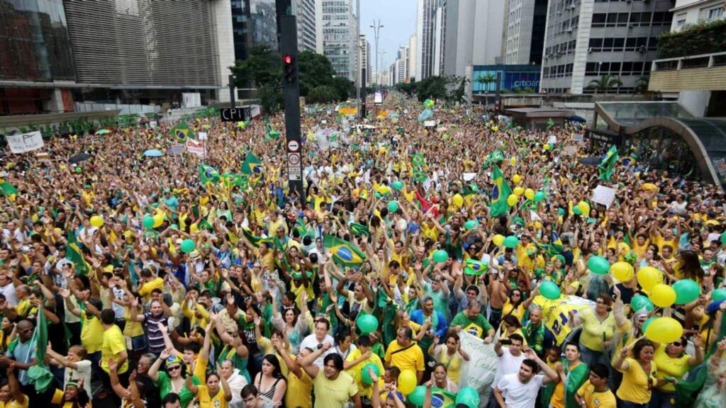 Protesters in cities across Brazil held marches to pressure Rousseff over unpopular budget cuts and a corruption scandal that has snared leaders of her political coalition. Photograph: Paulo Whitaker/Reuters