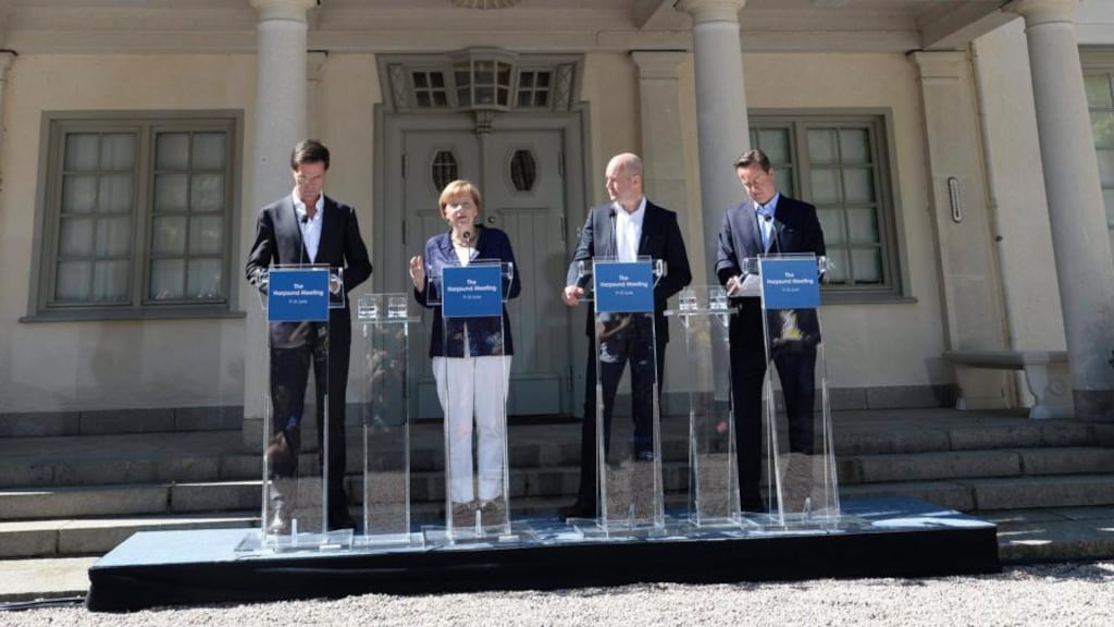 Dutch prime minister Mark Rutte (left), Swedish prime minister Fredrik Reinfeldt (second right) and British prime minister David Cameron (right) listen as German chancellor Angela Merkel speaks during a news conference at Mr Reinfeldt’s summer residence in Harpsund, south of Stockholm, today. Ms Merkel has reaffirmed her support for Jean-Claude Juncker becoming the next president of the European Commission after meeting EU leaders critical of the Luxembourger. Photograph: Maja Suslin/EPA