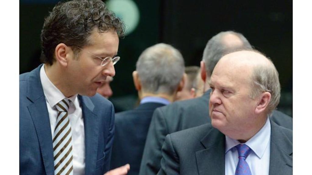 Minister for Finance Michael Noonan (right) talks to Dutch finance minister and eurogroup chairman Jeroen Dijsselbloem at an ecofin meeting at the European Union Council meeting in Brussels today. Photograph: Reuters