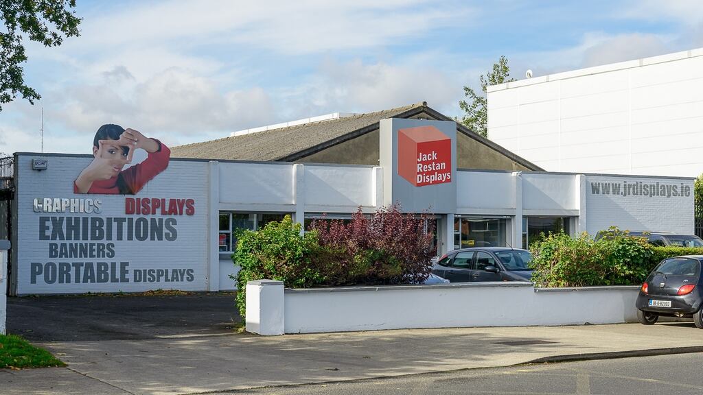 The building is located on a high profile site on the west side of the Walkinstown Road opposite a Lidl supermarket