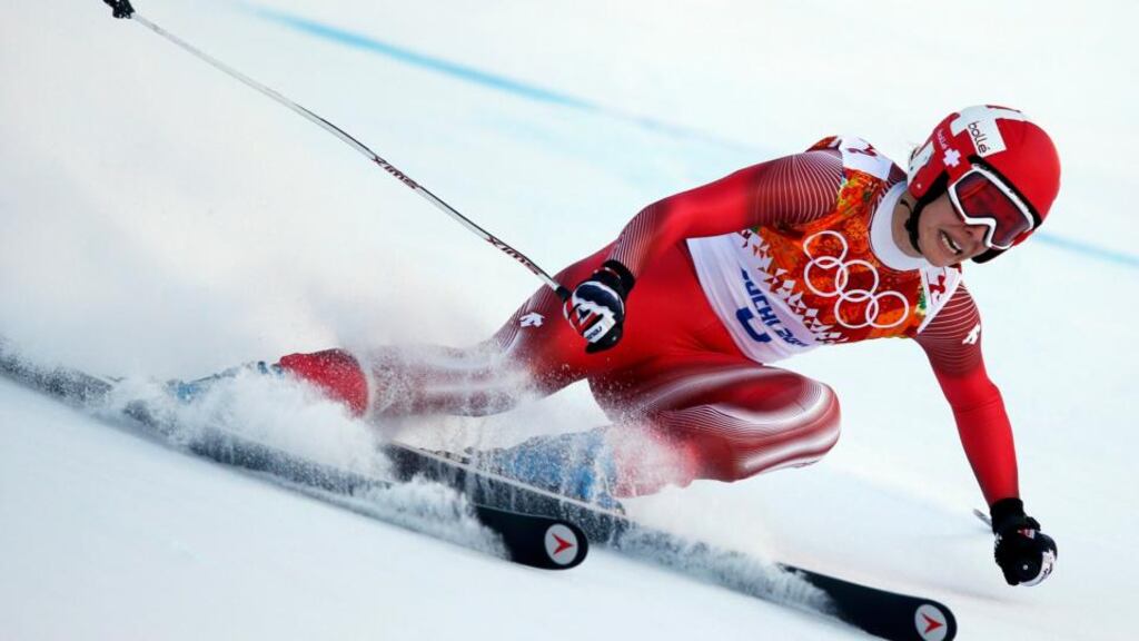 Unheralded Dominique Gisin of Switzerland on her way to what would turn out to be the joint-quickest run in the women’s downhill final at Soichi yesterday, and see her share gold with Tina Maze of Slovenia. Photograph: Mike Segar/Reuters