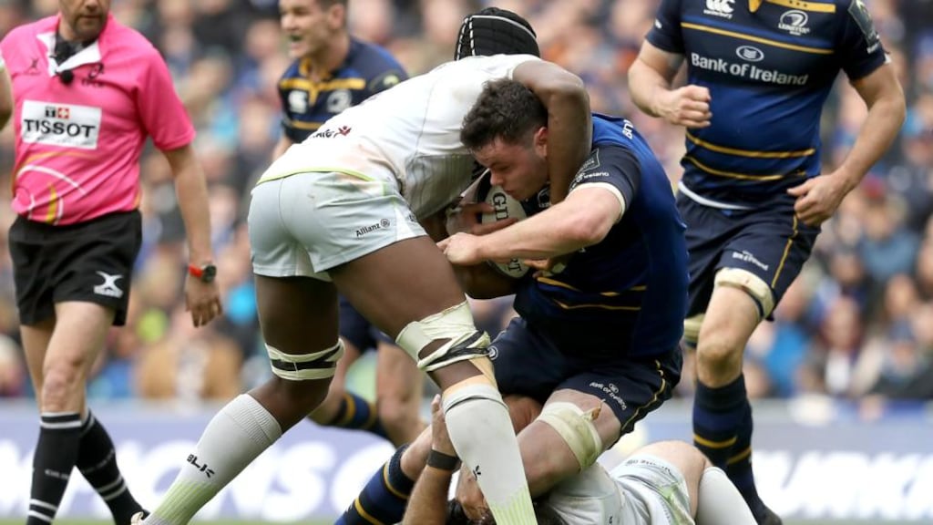 Leinster's James Ryan is tackled by Maro Itoje and Jamie George of Saracens. Photograph: Inpho