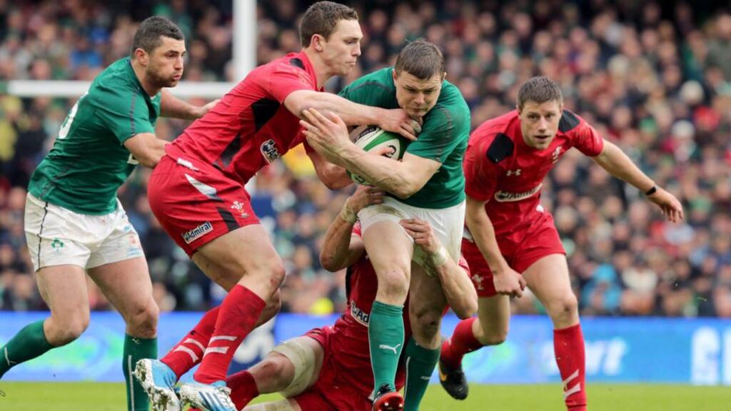 George North, seen here tackling Brian O’Driscoll, was moved to centre after Scott Williams injured his shoulder tackling the Ireland player during the Six Nations game at the Aviva Stadium. Photograph: Morgan Treacy/Inpho