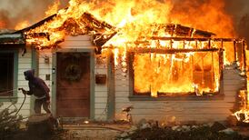 LA fires in pictures: Homes and businesses destroyed as blazes swarm Hollywood