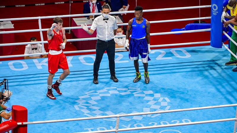 Aidan Walsh celebrates after being announced as the winner. Photo: Steve McArthur/Inpho