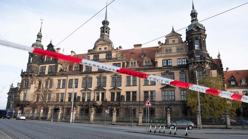 A police cordon in front of the Royal Palace housing the Green Vault in Dresden on Monday. Photograph: Sebastian Kahnert/dpa/AFP via Getty Images