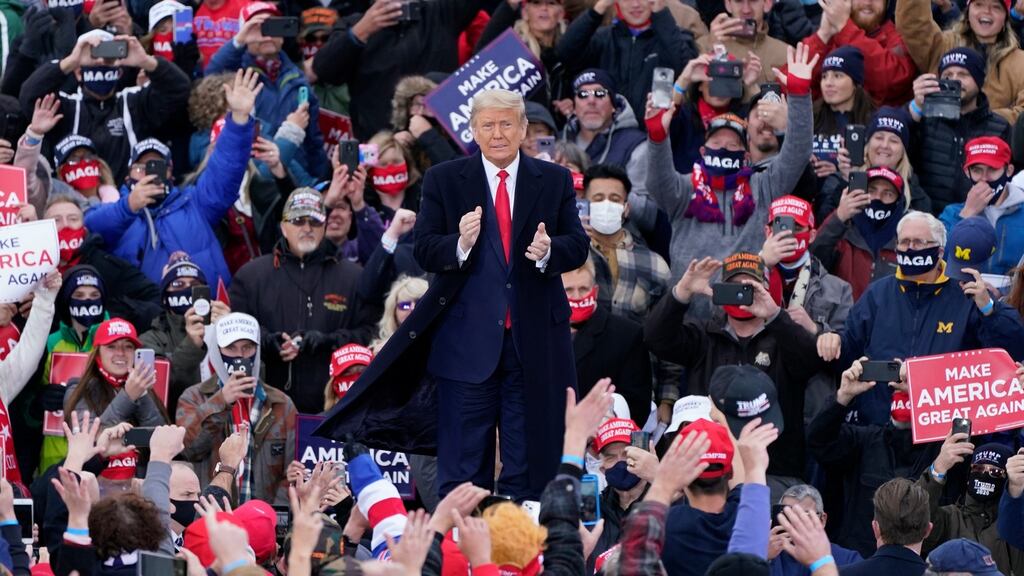 President Donald Trump arrives at a campaign rally in Norton Shores, Michigan. Photograph: Carlos Osorio/ AP