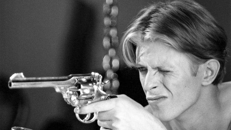 David Bowie on the set of The Man Who Fell to Earth. Photograph: Geoff MacCormack
