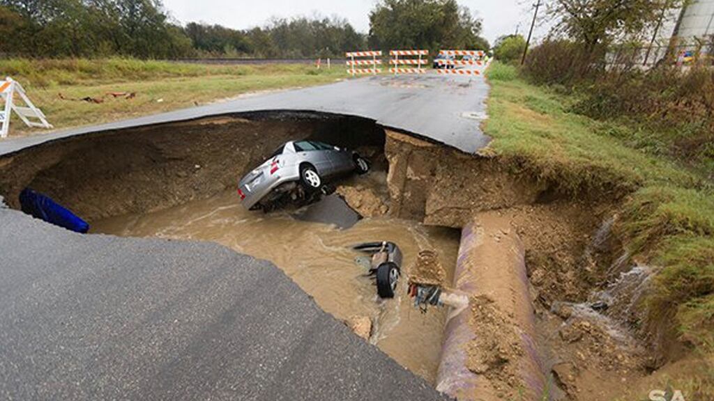 The sinkhole that opened up Sunday in San Antonio, killing an off-duty sheriff’s deputy. Photograph: San Antonio Fire Department via AP