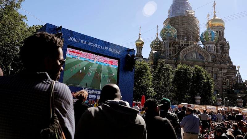 Fans watch the broadcast of Portugal v Morocco at the Saint Petersburg Fan Fest. Photograph: Henry Romero/Reuters