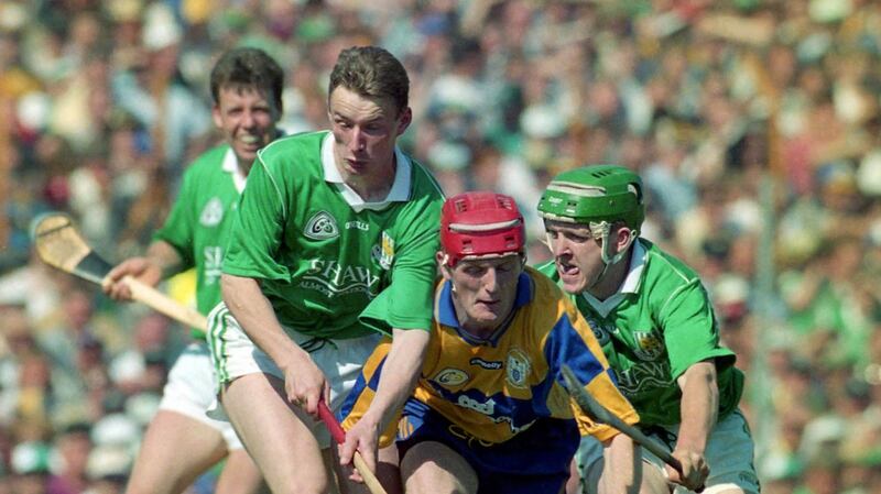Clare’s Brian Lohan is challenged by Limerick’s Pádraig Tobin during the Munster semi-final in 1996. Photograph: Lorraine O’Sullivan/Inpho