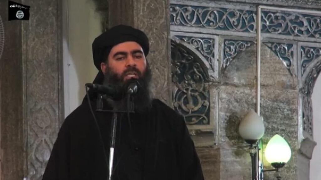 A photograph made from a video released today by the jihadist affiliated group Furqan Media via their twitter account allegedly showing Islamic State leader Abu Bakr al-Baghdadi delivering a sermon during Friday prayers at a mosque in Mosul, Iraq. Photograph: Furqan Media/Reuters