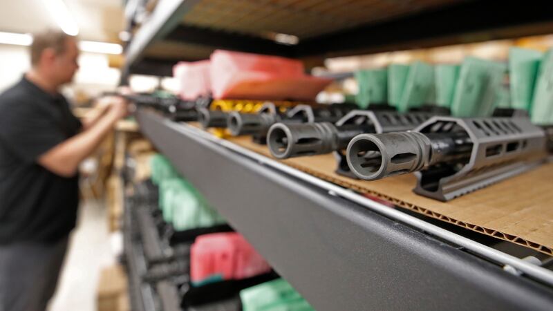 Finished AR-15 rifle barrels stacked on shelves at a Delta Team Tactical firearms shop in Orem, Utah. Photograph: George Frey/AFP via Getty Images
