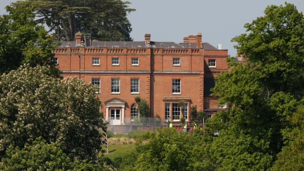 A security fence surrounds The Grove hotel which is hosting the annual Bilderberg conference in Watford, England. Photograph: Oli Scarff/Getty Images