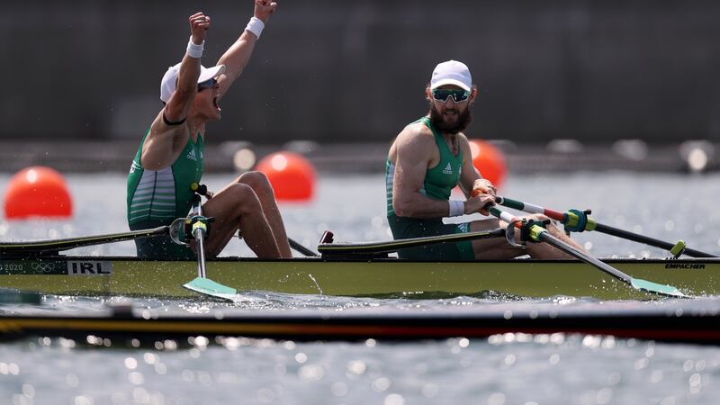 Fintan McCarthy and Paul O’Donovan celebrate after winning gold at the Tokyo 2020 Olympic Games. Photo: Naomi Baker/Getty Images