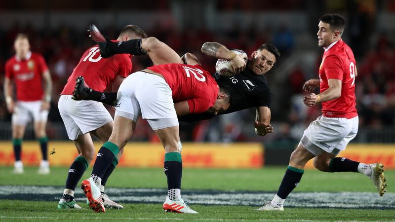Sonny Bill Williams of the All Blacks is tackled by Owen Farrell and Ben Te’o of the Lions. Photo: David Rogers/Getty Images