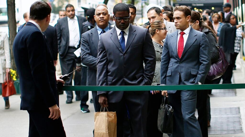 A file photograph of US jobseekers standing in line to meet with prospective employers at a career fair in New York City. Photograph: Mike Segar/Files/Reuters.