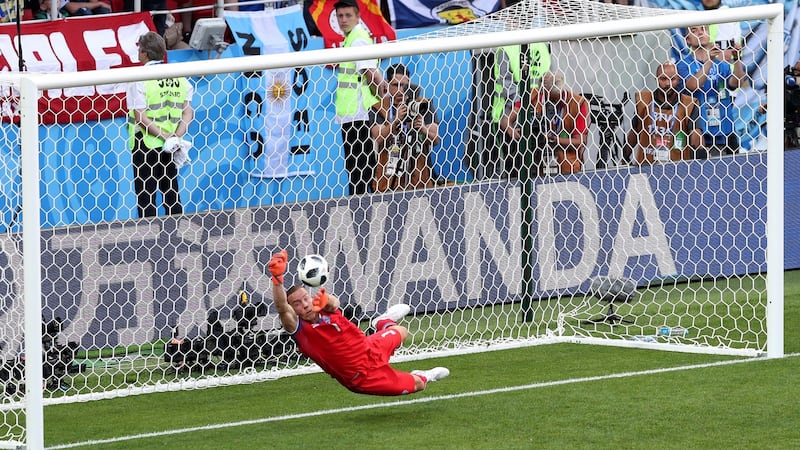 Hannes Halldorsson is equal to Lionel Messi’s penalty in Moscow. Photograph: Clive Rose/Getty