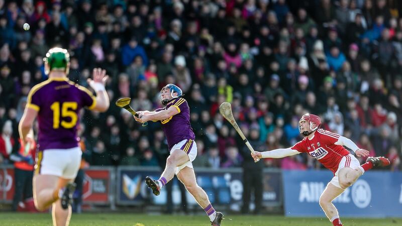 Wexford’s Kevin Foley scores a point against Cork. Photograph: Laszlo Geczo/Inpho