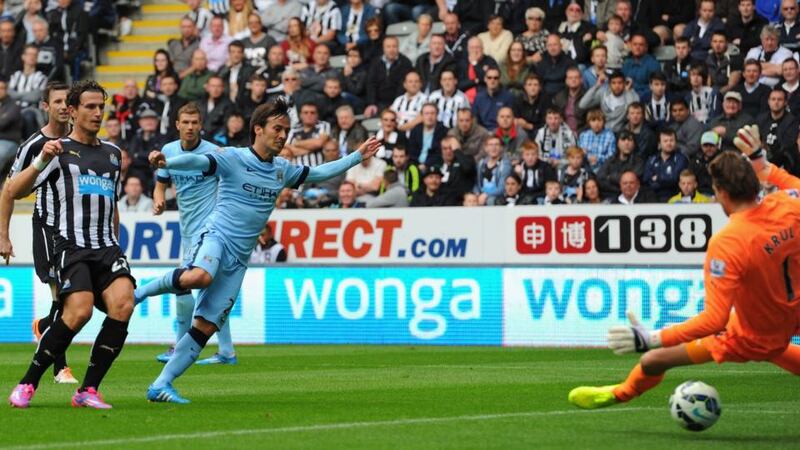 David Silva of Manchester City scores the opening goal against Newcastle United. Photograph: Stu Forster/Getty Images