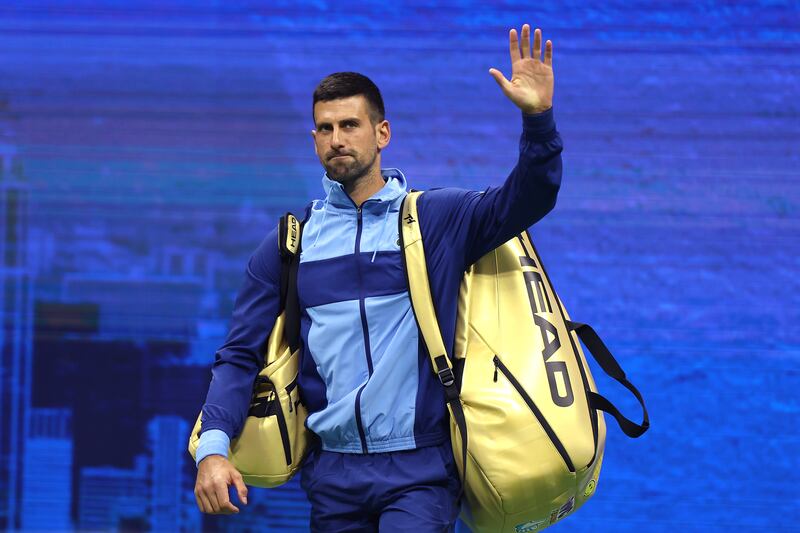 Novak Djokovic with his gold bags in the wake of his win at the Paris Olympics. Photograph: Luke Hales/Getty Images