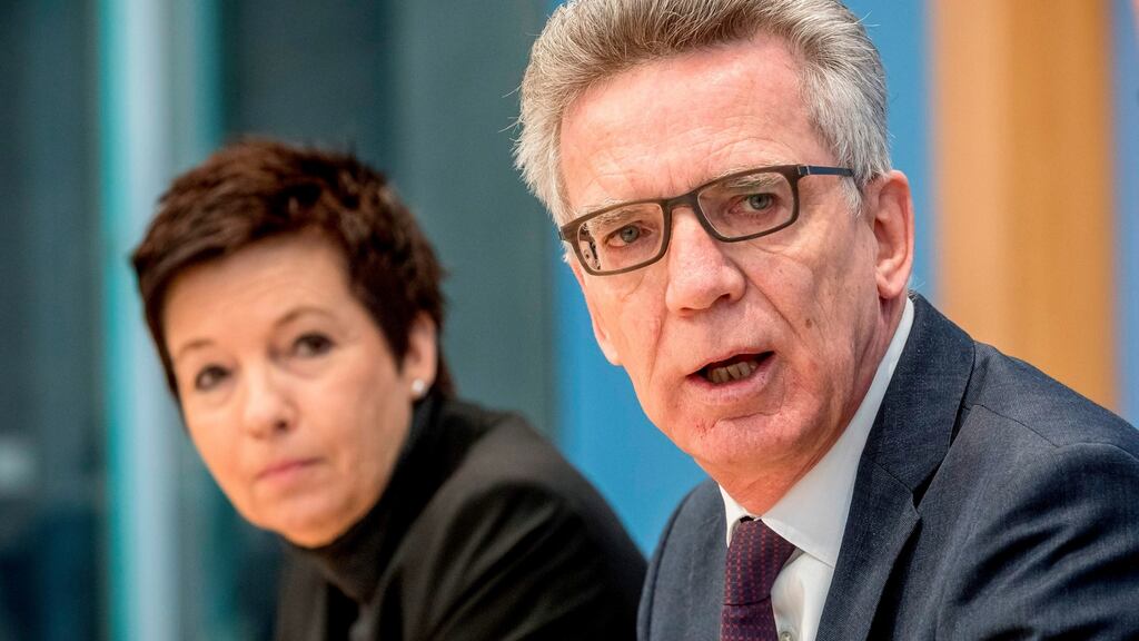 President of Germany’s Federal Office for Migration and Refugees Jutta Cordt and interior minister Thomas de Maizière: “The federal office for migration and refugees is no longer preoccupied with managing the crisis consequences,” said Mr de Maizière. Photograph: Michael Kappeler/AFP/Getty