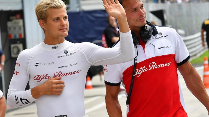 Ericsson returns to the pitlane after a medical checkup. Photo: Daniel Dal Zennaro/EPA