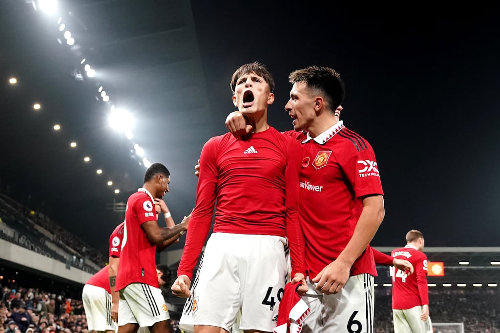 Manchester United's Alejandro Garnacho (left) celebrates after he scores the winner. Photograph: Zac Goodwin/PA