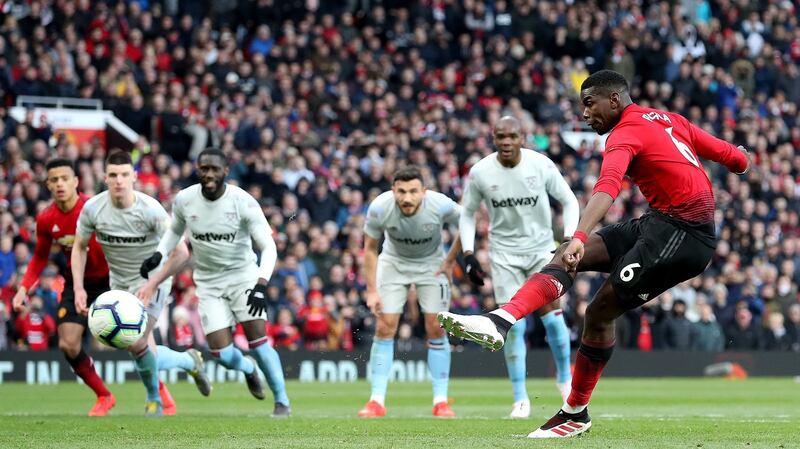 Paul Pogba scores Manchester United’s second penalty against West Ham. Photograph: Martin Rickett/PA