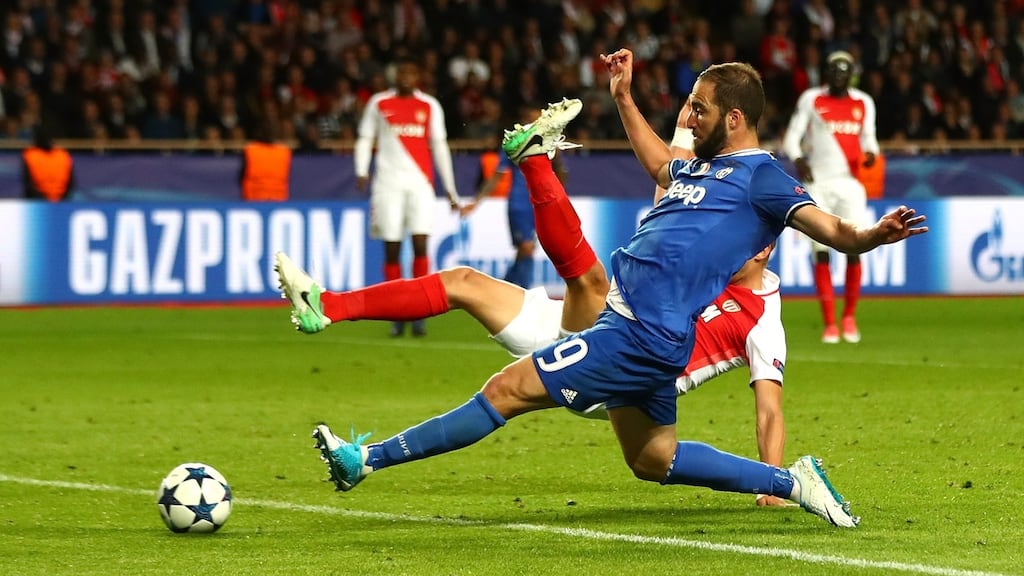 Gonzalo Higuain scores his and Juventus’ second goal in the Champions League semi-final 1st leg against Monaco at Stade Louis II. Photograph: Michael Steele/Getty Images