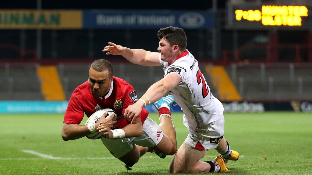 Munster’s Simon Zebo scores his side’s fifth try of the Pro12 game against Ulster at Thomond Park, Limerick. Photograph: Inpho