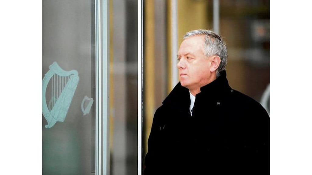 Eamonn Lillis leaving the Criminal Court Complex at the Phoenix Park. The court heard yesterday gardaí had asked Mr Lillis if he was infatuated with the massage therapist. "Yes, I suppose it was a sort of mid-life crisis," he replied.