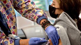 Top Pfizer scientist defends booster push and vaccine potency