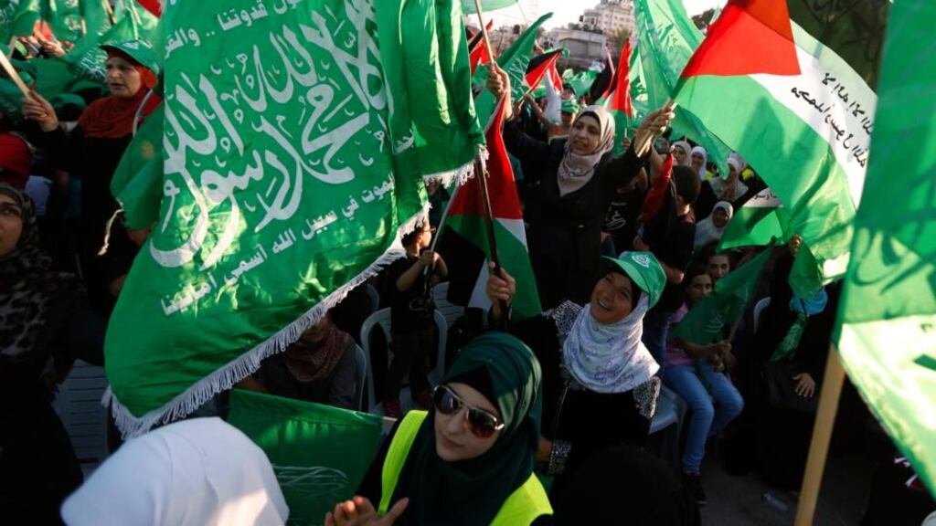 ‘The majority of people in Gaza and the West Bank believes that Hamas won the latest battle in the long-running war between Palestinians  and Israeli authorities.’ Above, Hamas supporters take part in a rally celebrating what organisers say was a victory by Palestinians in Gaza over Israel following a ceasefire, in the West Bank city of Ramallah.   Photograph: Mohamad Torokman/Reuters