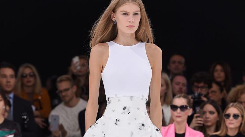 A model in Christian Dior on the catwalk at Paris Fashion Week. Photograph: Pascal Le Segretain/Getty Image