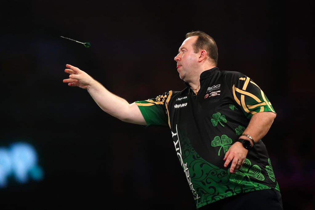 Brendan Dolan in action during his third round match against Michael van Gerwen at the World Darts Championship at Alexandra Palace, London. Photograph: Zac Goodwin/PA