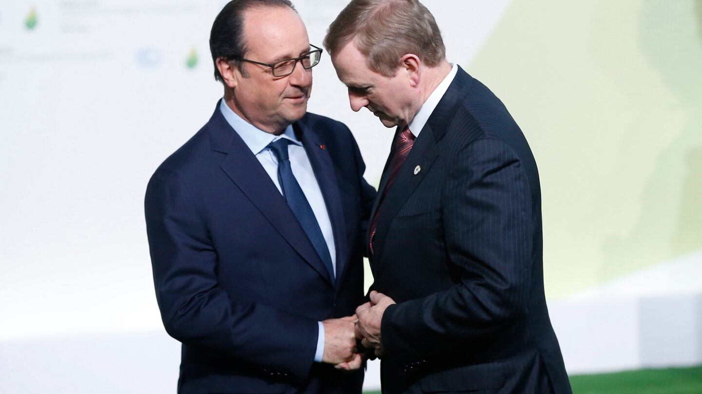 French president Francois Hollande (left) greets ITaoiseach Enda Kenny as he arrives at the COP21 World Climate Change Conference 2015 in Le Bourget, north of Paris, on Monday. Photograph: EPA