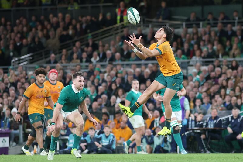 Australia's Noah Lolesio catches the ball during the game against Ireland. Photograph: Evan Treacy/PA Wire