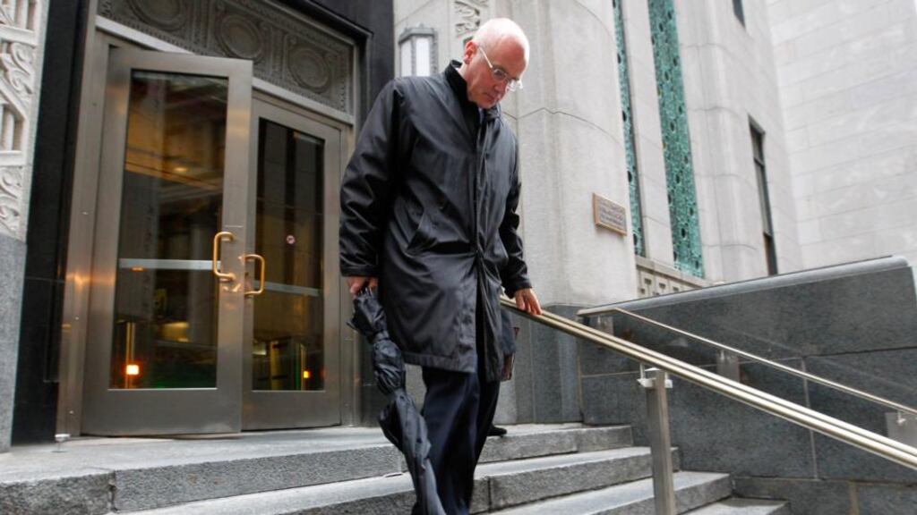 David Drumm walks from the John W McCormack courthouse  in Boston, Massachusetts. Photograph: Matthew Healey