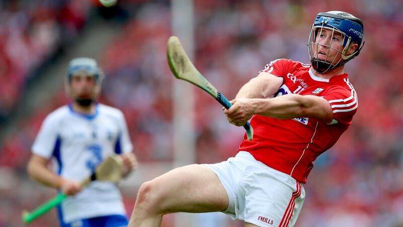 Lehane knocks over a point against Waterford in the All-Ireland semi-final. Photo: James Crombie/Inpho