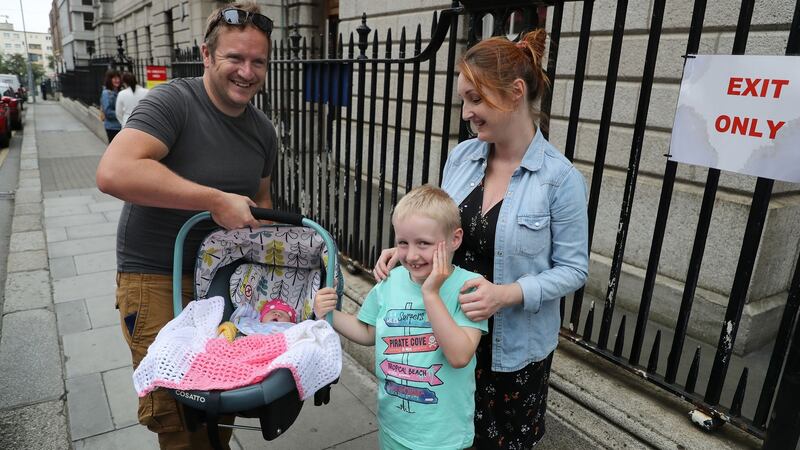 Ben Lowe, from Wicklow, with newborn Eleanor, son Michael (7) and  Tracey, his wife, after she gave  birth in the National Maternity Hospital. Photograph: Nick Bradshaw