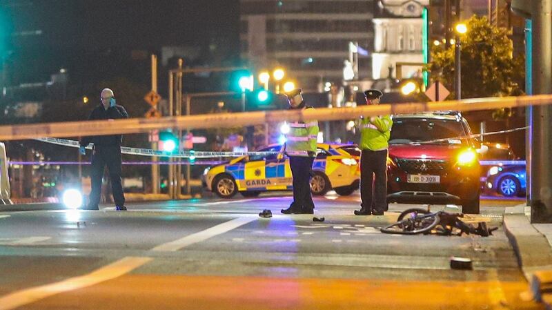 A bicycle lies on the ground of a suspected hit-and-run on North Wall Quay in Dublin city centre late on Monday. Brazilian man Thiago Osorio Cortes was fatally injured in the incident. Photograph: Damien Storan.