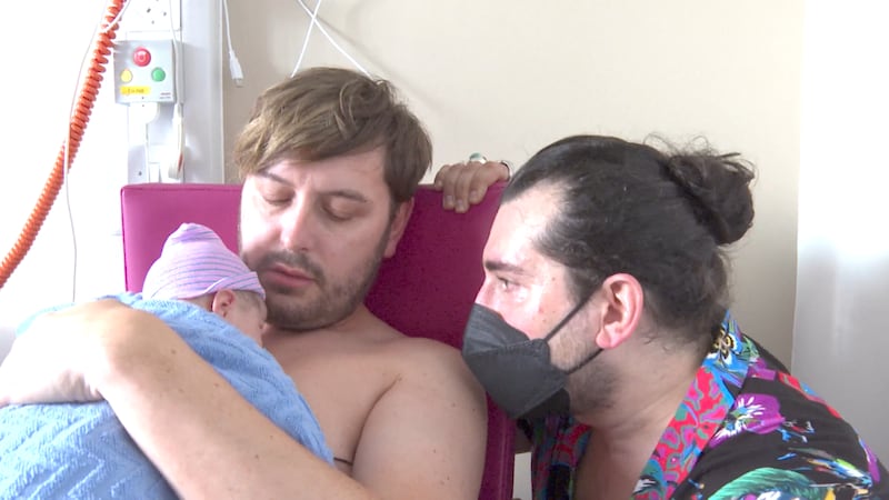 Brian Dowling and Arthur Gourounlian with their daughter. Photograph: RTÉ