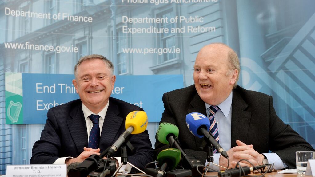 Brendan Howlin and Michael Noonan: may stay on in current jobs if election is won. Photograph: Alan Betson