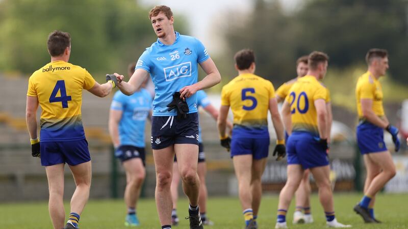 Peadar Ó Cofaigh Byrne and Roscommon’s Gary Patterson at the end of the Allianz Football League Division 1 South game at Dr Hyde Park. Photograph: James Crombie/Inpho
