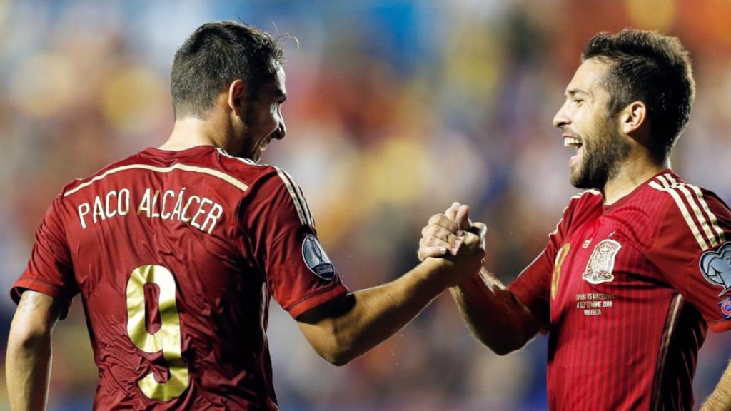 Francisco Alcacer celebrates with Jordi Alba after scoring Spain’s second goal against Macedonia. Photograph: EPA