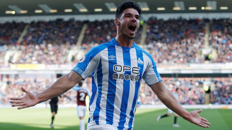 Huddersfield Town’s Christopher Schindler celebrates scoring their equaliser against Burnley at Turf Moor. Photograph: Andrew Yates/Reuters