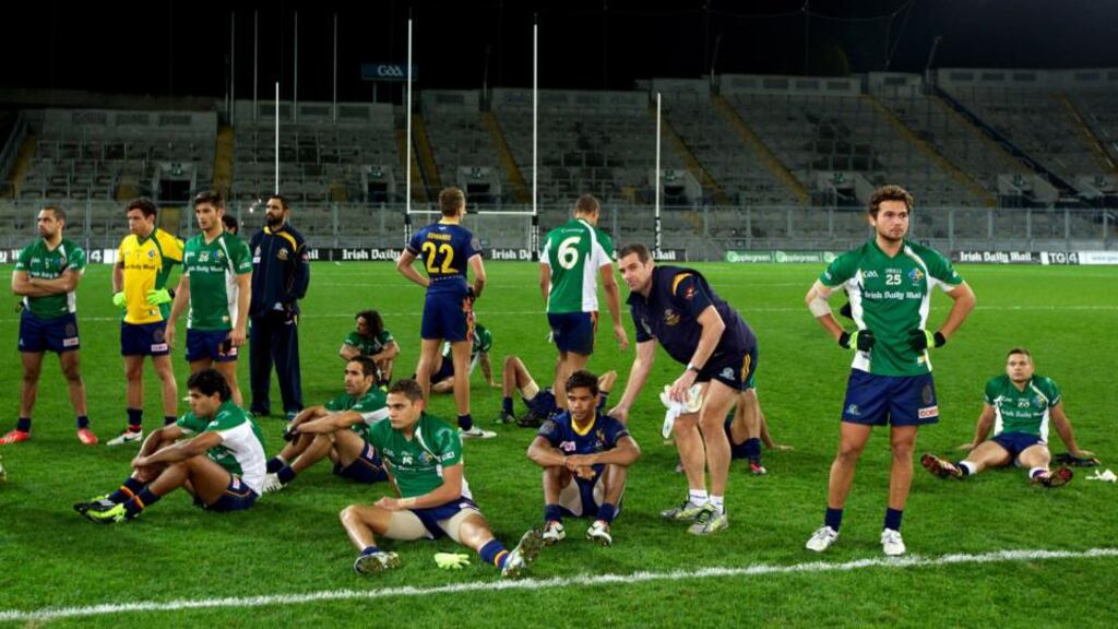 Dejected Australia players after their defeat to Ireland in the International Rules 2nd Test in Croke Park. Photograph: Patrick Bolger/Getty Images