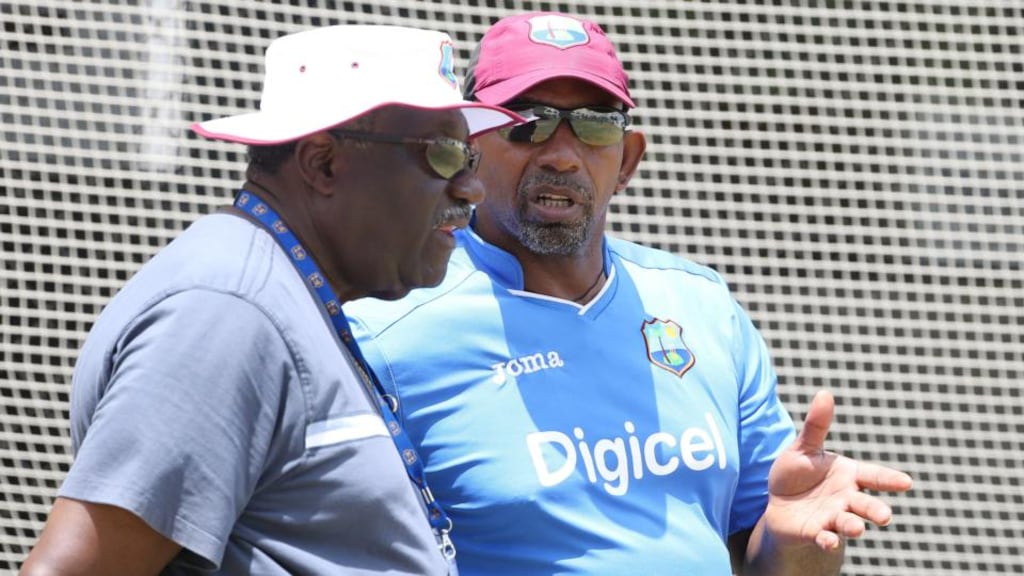 West Indies coach Phil Simmons talks to former Windies captain Clive Lloyd during nets ahead of the third Test against England at Kensington Oval in Barbados. Photo: Jason O’Brien/Action Images/Livepic