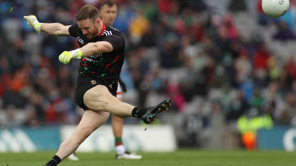 Rob Hennelly kicks the late equalising free which forced extra-time for Mayo in the memorable semi-final victory over Dublin at Croke Park. Photograph: James Crombie/Inpho